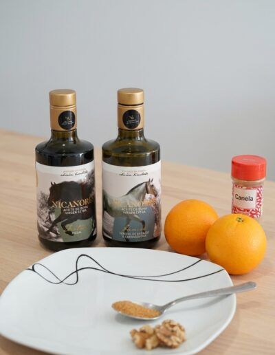 Ingredientes para preparar naranja con aceite de oliva virgen extra y nueces